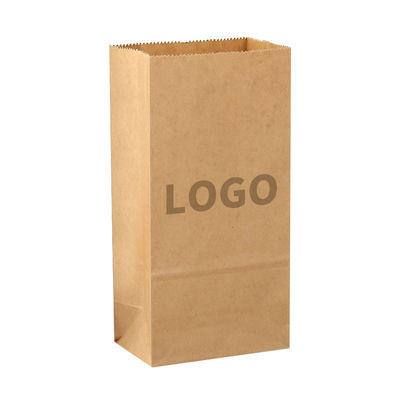 Un buen precio. Tiendas de flores bolsas de papel al por mayor bolsas de papel Kraft marrón con mango de cinta en línea